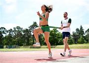 25 July 2024; Sophie Becker of Team Ireland with coach Ger O'Donnell during a Team Ireland athletics squad training session at Stade Philippe Mahut in Fontainebleau ahead of the 2024 Paris Summer Olympic Games in Paris, France. Photo by Sam Barnes/Sportsfile