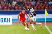 25 July 2024; Evan Caffrey of Shelbourne in action against Mariano Gomez of FC Zurich during the UEFA Conference League second qualifying round first leg match between FC Zurich and Shelbourne at Stadion Letzigrund in Zurich, Switzerland. Photo by Vedran Galijas/Sportsfile