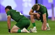 25 July 2024; Andrew Smith, left, and Terry Kennedy of Team Ireland after defeat in the Men's Rugby Sevens Quarter-Final match between Team Fiji and Team Ireland at the Stade de France during the 2024 Paris Summer Olympic Games in Paris, France. Photo by Brendan Moran/Sportsfile