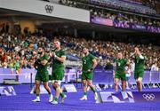 25 July 2024; Team Ireland players, from left, Mark Roche, Zac Ward, Andrew Smith, Hugo Lennox and Jack Kelly after defeat in the Men's Rugby Sevens Quarter-Final match between Team Fiji and Team Ireland at the Stade de France during the 2024 Paris Summer Olympic Games in Paris, France. Photo by Brendan Moran/Sportsfile