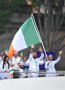 26 July 2024; Team Ireland, led by flagbearers Shane Lowry and Sarah Lavin, during the Opening Ceremony of the 2024 Paris Summer Olympic Games on the banks of the river Seine in Paris, France. Photo by Stephen McCarthy/Sportsfile