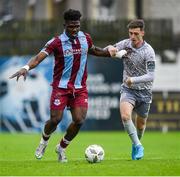 26 July 2024; Frantz Pierrot of Drogheda in action against Ben McCormack of Waterford during the SSE Airtricity Men's Premier Division match between Drogheda United and Waterford at Weavers Park in Drogheda, Louth. Photo by Shauna Clinton/Sportsfile