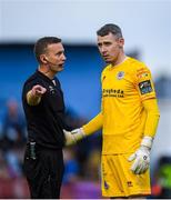 26 July 2024; Drogheda goalkeeper Luke Dennison remonstrates with referee Paul Norton during the SSE Airtricity Men's Premier Division match between Drogheda United and Waterford at Weavers Park in Drogheda, Louth. Photo by Shauna Clinton/Sportsfile