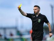 26 July 2024; Referee Declan Toland shows a yellow card to Darren Craven of Bray Wanderers during the SSE Airtricity Men's First Division match between Bray Wanderers and Wexford at Carlisle Grounds in Bray, Wicklow. Photo by Thomas Flinkow/Sportsfile