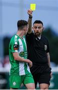 26 July 2024; Referee Declan Toland shows a yellow card to Kieran Cruise of Bray Wanderers during the SSE Airtricity Men's First Division match between Bray Wanderers and Wexford at Carlisle Grounds in Bray, Wicklow. Photo by Thomas Flinkow/Sportsfile