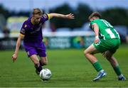 26 July 2024; Reece Webb of Wexford in action against Zach Nolan of Bray Wanderers during the SSE Airtricity Men's First Division match between Bray Wanderers and Wexford at Carlisle Grounds in Bray, Wicklow. Photo by Thomas Flinkow/Sportsfile