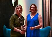26 July 2024; Lifetime Achievement recipient Sue Ramsbottom of Laois is presented with her award by former Mayo footballer Cora Staunton, left, at the GPA Football Legends Lunch at Croke Park in Dublin. Photo by Piaras Ó Mídheach/Sportsfile