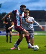 26 July 2024; Luke Heeney of Drogheda in action against Ryan Burke of Waterford during the SSE Airtricity Men's Premier Division match between Drogheda United and Waterford at Weavers Park in Drogheda, Louth. Photo by Shauna Clinton/Sportsfile