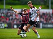 26 July 2024; Adam McDonnell of Bohemians tackles Scott McGill of Dundalk during the SSE Airtricity Men's Premier Division match between Bohemians and Dundalk at Dalymount Park in Dublin. Photo by Seb Daly/Sportsfile