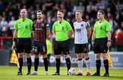 26 July 2024; Referee Eoghan O'Shea, centre, with, from left, assistant referee Eoin Harte, Bohemians captain Jordan Flores, Dundalk captain John Mountney and assistant referee Philip Harrison before the SSE Airtricity Men's Premier Division match between Bohemians and Dundalk at Dalymount Park in Dublin. Photo by Seb Daly/Sportsfile
