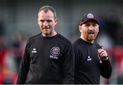 26 July 2024; Bohemians first team coach Derek Pender, left, and assistant manager Stephen O'Donnell before the SSE Airtricity Men's Premier Division match between Bohemians and Dundalk at Dalymount Park in Dublin. Photo by Seb Daly/Sportsfile
