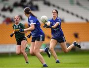 27 July 2024; Ellie Brady of Cavan hand passes to teammate Emma Tolan during the ZuCar All-Ireland Ladies Football U-18 Championship A final match between Cavan and Kerry at O’Connor Park in Tullamore, Offaly. Photo by Michael P Ryan/Sportsfile