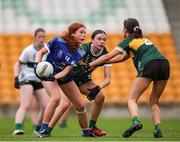 27 July 2024; Katie O'Meara of Cavan in action against Aoise O'Donoghue of Kerry during the ZuCar All-Ireland Ladies Football U-18 Championship A final match between Cavan and Kerry at O’Connor Park in Tullamore, Offaly. Photo by Michael P Ryan/Sportsfile