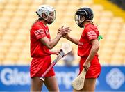 27 July 2024; Pamela Mackey and Laura Treacy of Cork after their side's victory in the Glen Dimplex Camogie All-Ireland Senior Championship semi-final match between Cork and Dublin at UPMC Nowlan Park in Kilkenny. Photo by Harry Murphy/Sportsfile