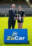 27 July 2024; Sligo captain Ciara Walsh is presented with the cup by Brendan Cregg, LGFA Vice-President after the ZuCar All-Ireland Ladies Football U-18 Championship B final match between Sligo and Tyrone at Brewster Park in Enniskillen, Fermanagh. Photo by Stephen Marken/Sportsfile