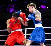 27 July 2024; Dean Clancy of Team Ireland, right, in action against Obada Alkasbeh of Team Jordan during the men's 63.5kg preliminary round of 32 bout at the North Paris Arena during the 2024 Paris Summer Olympic Games in Paris, France. Photo by David Fitzgerald/Sportsfile