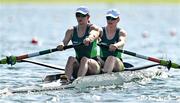 28 July 2024; Fiona Murtagh, left, and Aifric Keogh of Team Ireland in action during the women’s coxless pair heats at Vaires-sur-Marne Nautical Stadium during the 2024 Paris Summer Olympic Games in Paris, France. Photo by Brendan Moran/Sportsfile