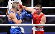 28 July 2024; Jack Marley of Team Ireland, right, in action against Mateusz Bereznicki of Team Poland in their men's 92kg preliminary round of 16 bout at the North Paris Arena during the 2024 Paris Summer Olympic Games in Paris, France. Photo by David Fitzgerald/Sportsfile