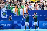 29 July 2024; Team Ireland supporters applaud Shane O’Donoghue, left, and Tim Cross of Team Ireland as they leave the field after their side's defeat in the men's pool B match between Team Ireland and Team Australia at the Yves-du-Manoir Stadium during the 2024 Paris Summer Olympic Games in Paris, France. Photo by David Fitzgerald/Sportsfile