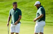 30 July 2024; Rory McIlroy, left, and Shane Lowry of Team Ireland during a practice round ahead of the men's golf singles at Le Golf National during the 2024 Paris Summer Olympic Games in Paris, France. Photo by Brendan Moran/Sportsfile