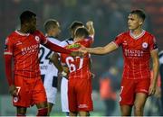 1 August 2024; Shelbourne players Rayhaan Tulloch, left, and Evan Caffrey shake hands after the UEFA Conference League second qualifying round second leg match between Shelbourne and FC Zurich at Tolka Park in Dublin. Photo by Thomas Flinkow/Sportsfile