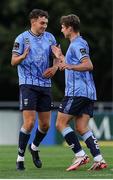 2 August 2024; Eanna Clancy of UCD, left, celebrates scoring his side's first goal of the match with teammate Adam Wells during the SSE Airtricity Men's First Division match between UCD and Wexford at UCD Bowl in Belfield, Dublin. Photo by Thomas Flinkow/Sportsfile