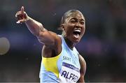 3 August 2024; Julien Alfred of Team Saint Lucia celebrates winning the women's 100m final at the Stade de France during the 2024 Paris Summer Olympic Games in Paris, France. Photo by Sam Barnes/Sportsfile