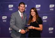 4 August 2024; Winner of Lulu Carroll Overall Volunteer of the Year award, at the first LGFA Volunteer Awards in 2017, Sheena Byrne is presented with a commemorative medallion by LGFA president Mícheál Naughton at a special lunch to celebrate key milestones in 50 years of the LGFA ahead of the 2024 TG4 All-Ireland Finals at Croke Park in Dublin. Photo by Seb Daly/Sportsfile