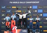 4 August 2024; Winners Sebastien Ogier and Vincent Landais, centre, celebrate alongside Thierry Neuville and Martijn Wydaeghe, left, who finished second, and Adrien Fourmaux and Alexandre Coria, who finished third, after the FIA World Rally Championship Secto Rally in Jyvaskyla, Finland. Photo by Philip Fitzpatrick/Sportsfile