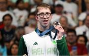 4 August 2024; Daniel Wiffen of Team Ireland with his bronze medal during the awards ceremony after the men's 1500m freestyle final at the Paris La Défense Arena during the 2024 Paris Summer Olympic Games in Paris, France. Photo by Stephen McCarthy/Sportsfile