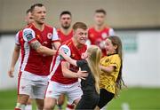 4 August 2024; Brandon Kavanagh of St Patrick's Athletic celebrates with supporters after scoring his side's third goal during the SSE Airtricity Men's Premier Division match between St Patrick's Athletic and Sligo Rovers at Richmond Park in Dublin. Photo by Stephen Marken/Sportsfile