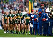 4 August 2024; Kerry captain Niamh Carmody, 10, leads her team behind the Artane Band in the traditional pre match parade before the TG4 All-Ireland Ladies Football Senior Championship final match between Galway and Kerry at Croke Park, Dublin. Photo by Ray McManus/Sportsfile