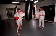 6 August 1998; Former world boxing champion Steve Collins, right, with Denis Galvin during a Coaching Session at Olympus Gym in Dublin. Photo by David Maher/Sportsfile