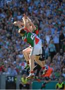 22 September 2013; Eoghan O'Gara, Dublin, in action against Lee Keegan and Donal Vaughan, Mayo. GAA Football All-Ireland Senior Championship Final, Dublin v Mayo, Croke Park, Dublin. Picture credit: Ray McManus / SPORTSFILE