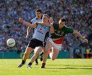 22 September 2013; Philip McMahon, Dublin, is tackled by Cillian O'Connor, Mayo. GAA Football All-Ireland Senior Championship Final, Dublin v Mayo, Croke Park, Dublin. Picture credit: Ray McManus / SPORTSFILE