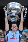 22 September 2013; Dublin's Cian O'Sullivan lifts the Sam Maguire Cup following their victory. GAA Football All-Ireland Senior Championship Final, Dublin v Mayo, Croke Park, Dublin. Picture credit: Stephen McCarthy / SPORTSFILE