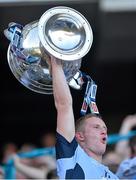 22 September 2013; Dublin's Ciaran Kilkenny lifts the Sam Maguire Cup following their victory. GAA Football All-Ireland Senior Championship Final, Dublin v Mayo, Croke Park, Dublin. Picture credit: Stephen McCarthy / SPORTSFILE