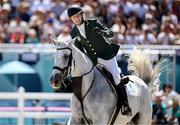 5 August 2024; Shane Sweetnam of Team Ireland, on James Kann Cruz, in action during the Jumping Individual Qualifier at the Château de Versailles during the 2024 Paris Summer Olympic Games in Paris, France. Photo by Stephen McCarthy/Sportsfile