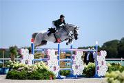 5 August 2024; Shane Sweetnam of Team Ireland, on James Kann Cruz, in action during the Jumping Individual Qualifier at the Château de Versailles during the 2024 Paris Summer Olympic Games in Paris, France. Photo by Stephen McCarthy/Sportsfile