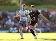 9 August 2024; Dayle Rooney of Bohemians in action against Samuel Glenfield of Waterford during the SSE Airtricity Men's Premier Division match between Bohemians and Waterford at Dalymount Park in Dublin. Photo by Thomas Flinkow/Sportsfile