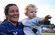 10 August 2024; Hannah O'Connor of Leinster and Con McCormack, aged 2, from Galway after the Vodafone Women’s Interprovincial Championship Round One match between Leinster and Connacht at Energia Park in Dublin. Photo by Shauna Clinton/Sportsfile