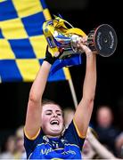 11 August 2024; Tipperary captain Sinéad Meagher lifts the Kathleen Mills cup after her side's victory in the All-Ireland Premier Junior Camogie Championship final between Laois and Tipperary at Croke Park in Dublin. Photo by Piaras Ó Mídheach/Sportsfile