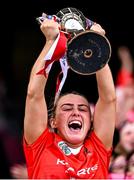 11 August 2024; Cork captain Lauren Homan lifts the Jack McGrath Cup after her side's victory in the All-Ireland Premier Intermediate Camogie Championship final between Cork and Kilkenny at Croke Park in Dublin. Photo by Piaras Ó Mídheach/Sportsfile