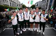 12 August 2024; Team Ireland members, from left, Rhys McClenaghan, Daire Lynch, Philip Doyle Mona McSharry, Daniel Wiffen and Fintan McCarthy are welcomed by supporters on O'Connell Street in Dublin, celebrating their remarkable achievements at the Paris 2024 Olympic Games. Photo by Ramsey Cardy/Sportsfile