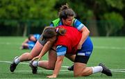 13 August 2024; Christy Haney, right, and Alice O'Dowd wresle during a Leinster Rugby women's training session at The High School in Rathgar, Dublin. Photo by Shauna Clinton/Sportsfile