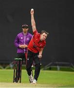 21 August 2024; Josh Manley of Munster Reds bowls during the Cricket Ireland Inter-Provincial IP20 Trophy match between Munster Reds and Northern Knights at The Mardyke in Cork. Photo by Matt Browne/Sportsfile