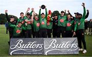 25 August 2024; Lisburn captain Neil Whitworth, centre, lifts the trophy alongside teammates after their side's victory in the Butlers Men's All-Ireland T20 Cup Final match between Leinster and Lisburn at Phoenix Park in Dublin. Photo by Seb Daly/Sportsfile