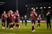 25 August 2024; Bobby Burns of Galway United, right, applauds toward the travelling supporters alongside his teammates after the SSE Airtricity Men's Premier Division match between Shamrock Rovers and Galway United at Tallaght Stadium in Dublin. Photo by Ben McShane/Sportsfile