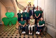 27 August 2024; An Taoiseach Simon Harris TD, middle, Ambassador of Ireland to France Niall Burgess, Paralympics Ireland Chief Executive Stephen McNamara, both back row, and Paralympics Ireland President Eimear Breathnach, front, with Team Ireland athletes and board members during a reception at the Embassy of Ireland in advance of the Paris 2024 Paralympic Games in Paris, France. Photo by Harry Murphy/Sportsfile