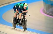 29 August 2024; Pilot Mitchell McLaughlin, right, and Damien Vereker of Ireland in action during the men's B 4000m individual pursuit qualification race on day one of the Paris 2024 Paralympic Games at Vélodrome de Saint-Quentin-en-Yvelines in Paris, France. Photo by Ramsey Cardy/Sportsfile